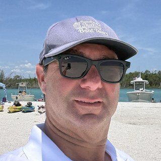 Captain Evan, owner and lead captain of Sand Dollar Shelling
